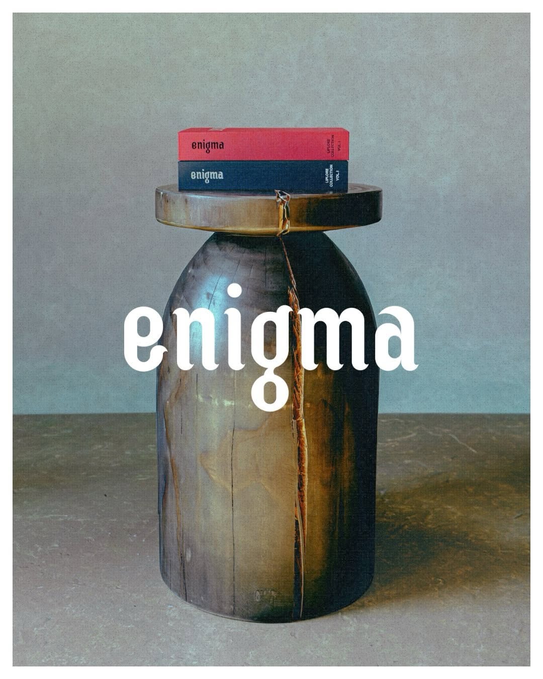 enigma brand logo sculpted on wood display